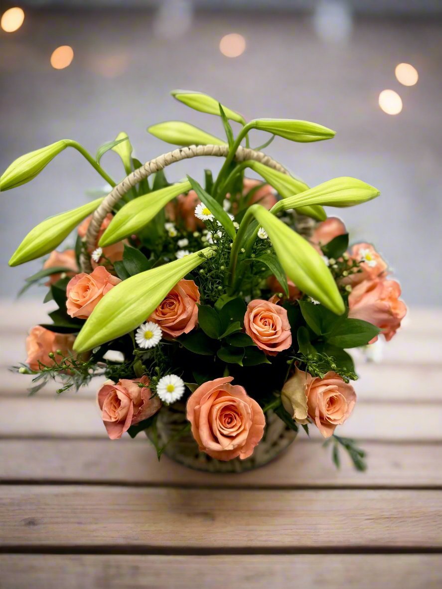 Salmon Rose & St. Joseph Basket Arrangement - Impala Online